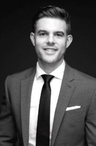 Branch Manager and Mortgage Loan Advisor, Nathan Burrell in black and white