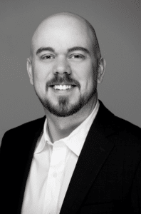 Branch Manager and Mortgage Loan Advisor, Zach Spencer in black and white